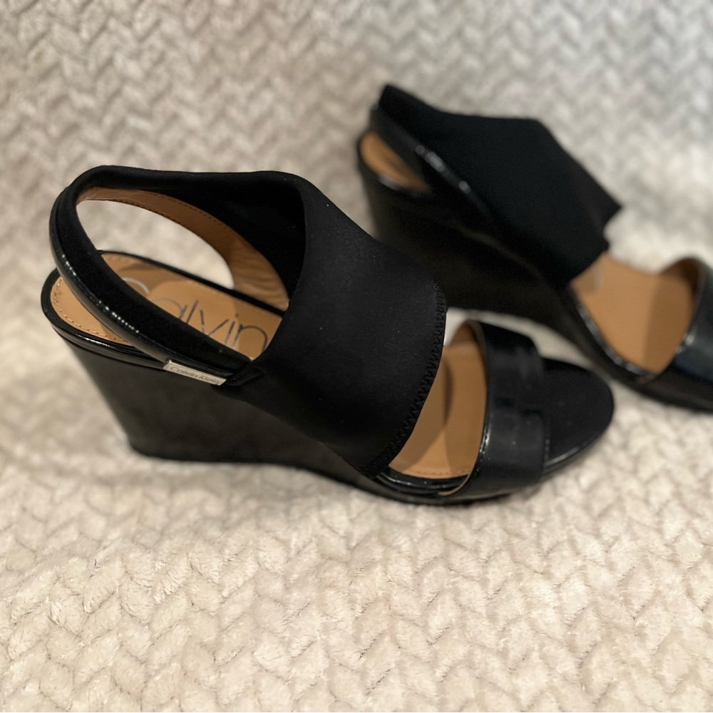 Black Calvin Klein wedges. Size 6.5 W like new